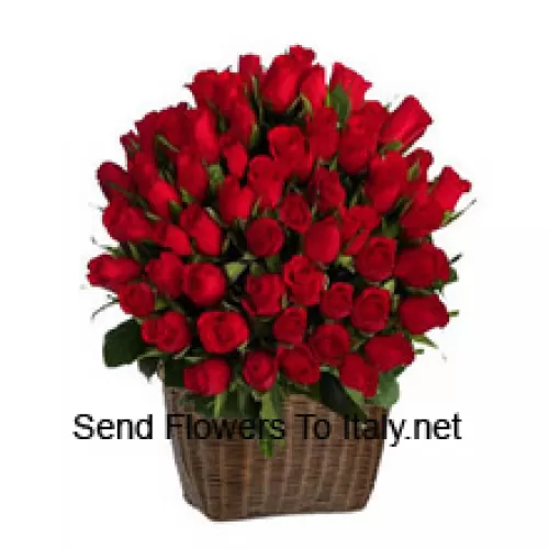 A Tall Basket Of 75 Red Roses With Seasonal Fillers