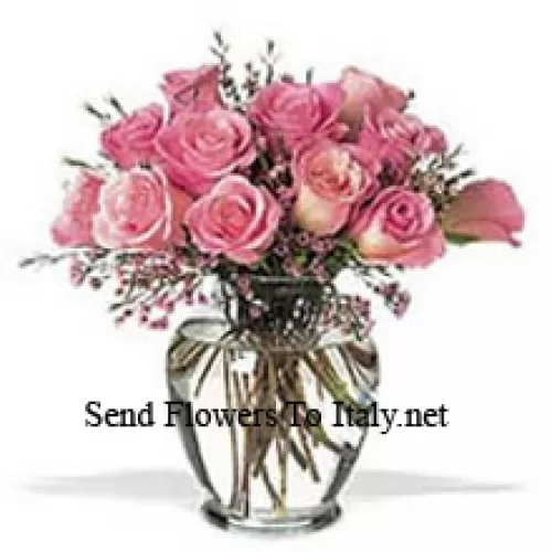 Bunch Of 11 Pink Roses With Some Ferns In A Vase