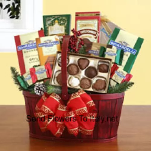 Our handsome red splitwood handle basket is all decked out in holiday splendor, and packed with a sweet sampling of Ghirardelli's greatest chocolate creations. There's plenty inside to discover and enjoy, and the sweet excess will keep your recipients smiling for days. We've included: two gift bags of Ghirardelli squares (mint chocolate & dark chocolate), truffle cookies, a caramel chocolate bar, hot cocoa mix, and an assortment of Ghirardelli chocolate squares. We top it off with a festive bow, and add silk greenery and accents to make sure this Christmas present is a memorable one (Please Note That We Reserve The Right To Substitute Any Product With A Suitable Product Of Equal Value In Case Of Non-Availability Of A Certain Product)