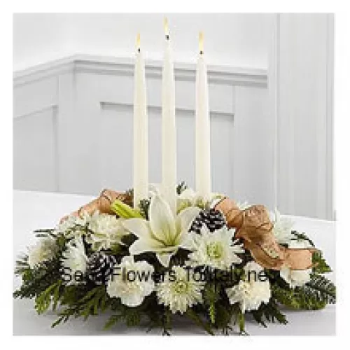 Celebrates the holiday season with winter grace and style. White Asiatic lilies, carnations and chrysanthemums create an exquisite display accented with holiday greens, snow-tipped pinecones and sheer copper ribbon. Surrounding three white taper candles, this holiday centerpiece will add light and love to their seasonal celebration. (Please Note That We Reserve The Right To Substitute Any Product With A Suitable Product Of Equal Value In Case Of Non-Availability Of A Certain Product)